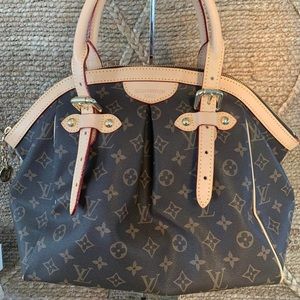 Fashion bag. Two tone brown coated canvas and leather handles.